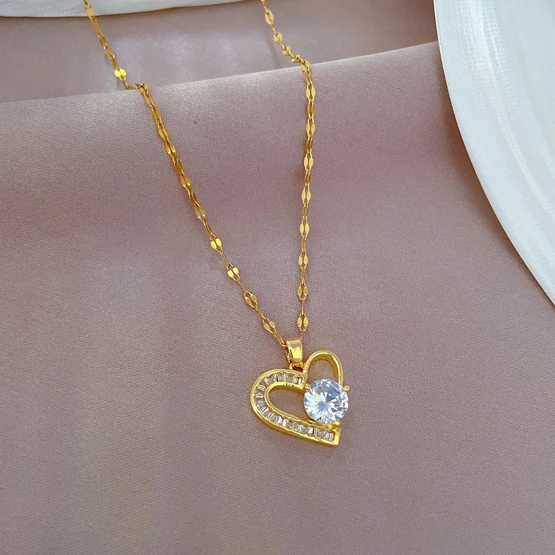 Elegante goldene Herzkette mit Zirkonstein N1980
